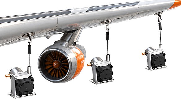Aircraft wings and draw wire sensors